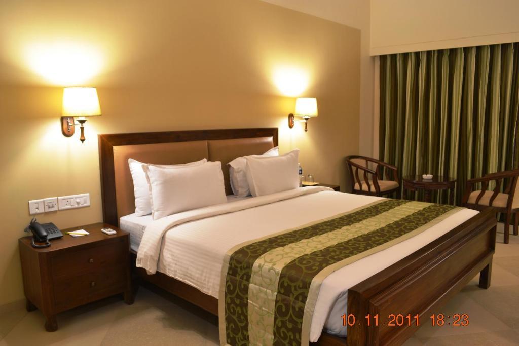 Uday Suites - The Airport Hotel Thiruvananthapuram Номер фото